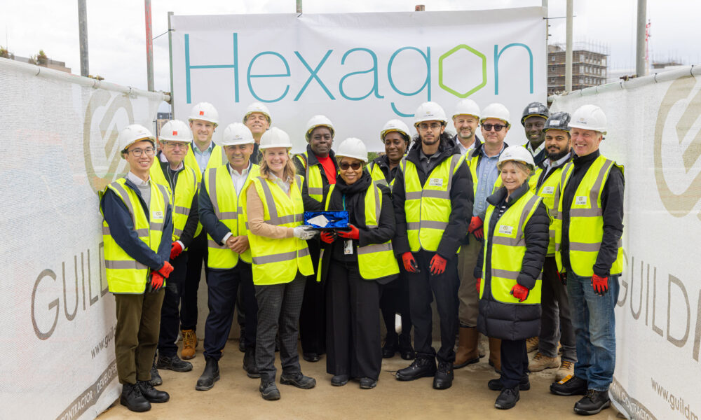 Topping Out Ceremony at Old Kent Road with representatives from Hexagon Housing Association, Southwark Council, Martin Arnold, and Guildmore Group.
