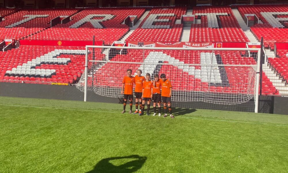 Fleetdown United FC U11s on the pitch at Old Trafford